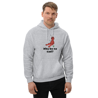 A man standing wearing a grey hoodie with a printed graphic of a voodoo doll and the words, Why be so sad? Designed by Wizard Prints.