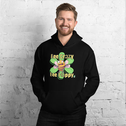 A man standing wearing a black hoodie with a printed graphic of a bee with the words, 'Bee Crazy Bee Happy'. Designed by Wizard Prints.