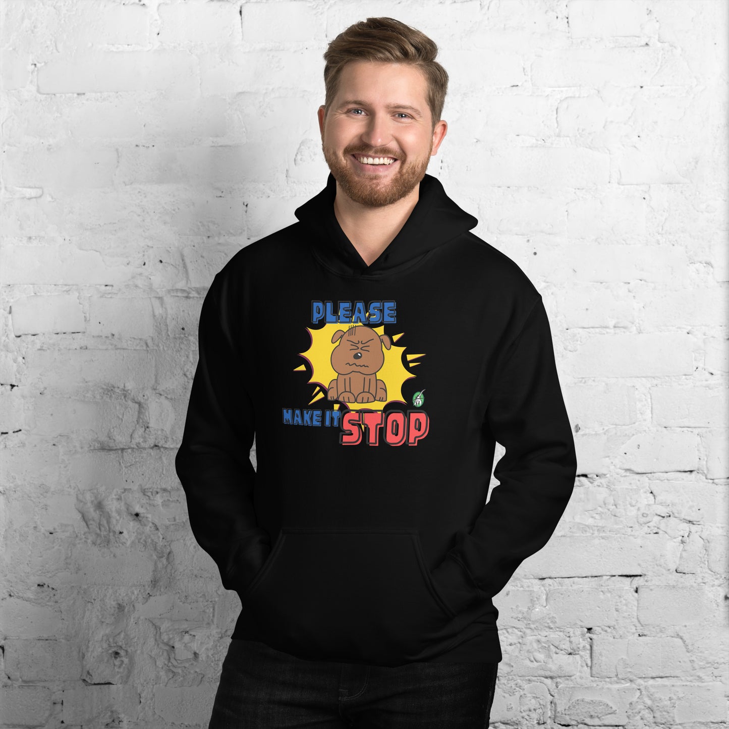 A man standing wearing a black hoodie with a printed graphic of a frowning dog with the words, Please Make It Stop. Designed by Wizard Prints.
