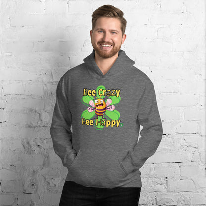 A man standing wearing a dark grey hoodie with a printed graphic of a bee with the words, 'Bee Crazy Bee Happy'. Designed by Wizard Prints.