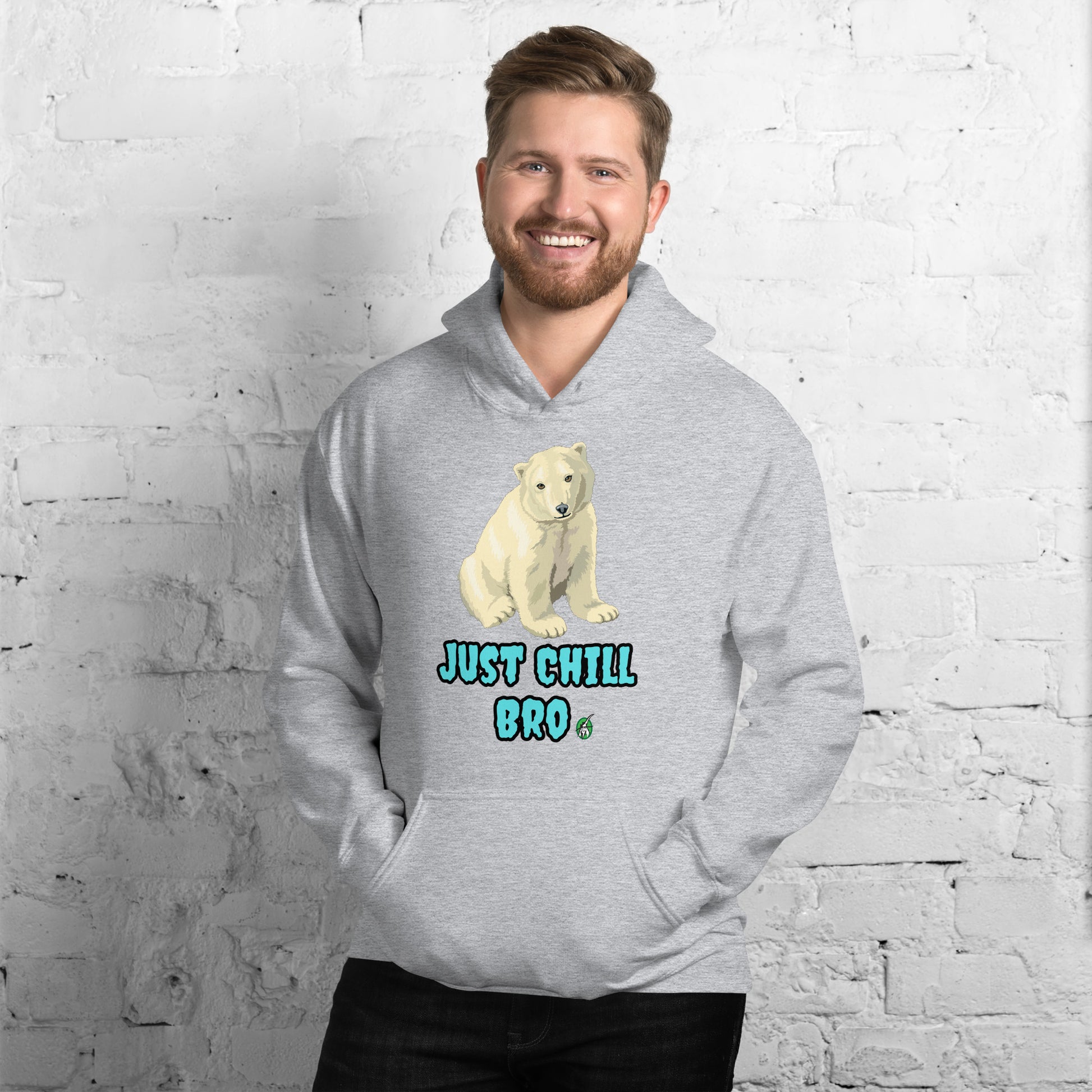 A man standing wearing a grey hoodie with a printed graphic of a bear with the words, 'Just Chill Bro'. Designed by Wizard Prints.