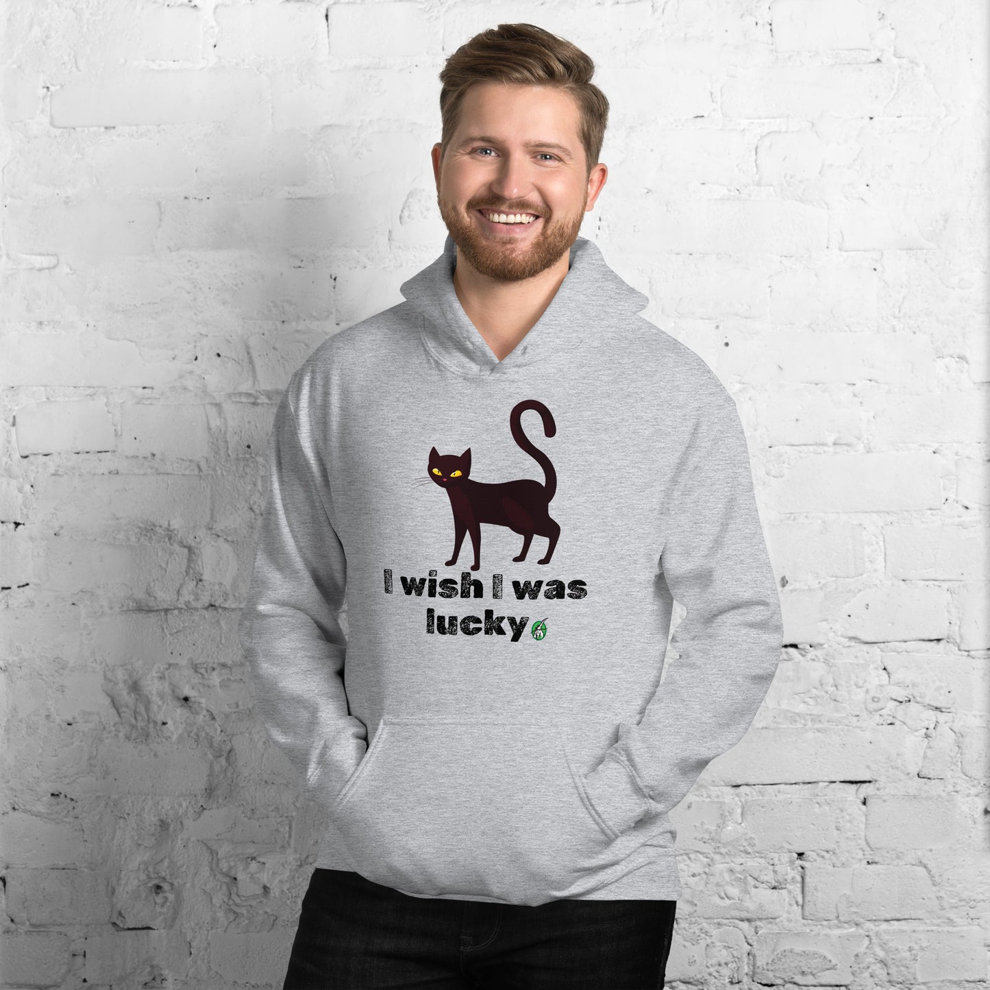 A man standing and wearing a grey hoodie with a printed graphic of a cat with the words, 'I wish I was lucky'. Designed by Wizard Prints.