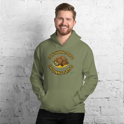 A man standing wearing a military green hoodie with a printed graphic of a turtle with the words, I Don't Wanna People I'm Gonna Turtle. Designed by Wizard Prints.