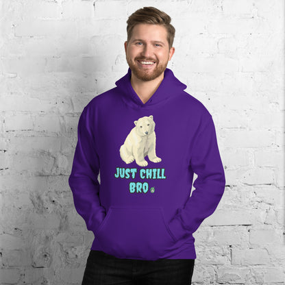 A man standing wearing a purple hoodie with a printed graphic of a bear with the words, 'Just Chill Bro'. Designed by Wizard Prints.