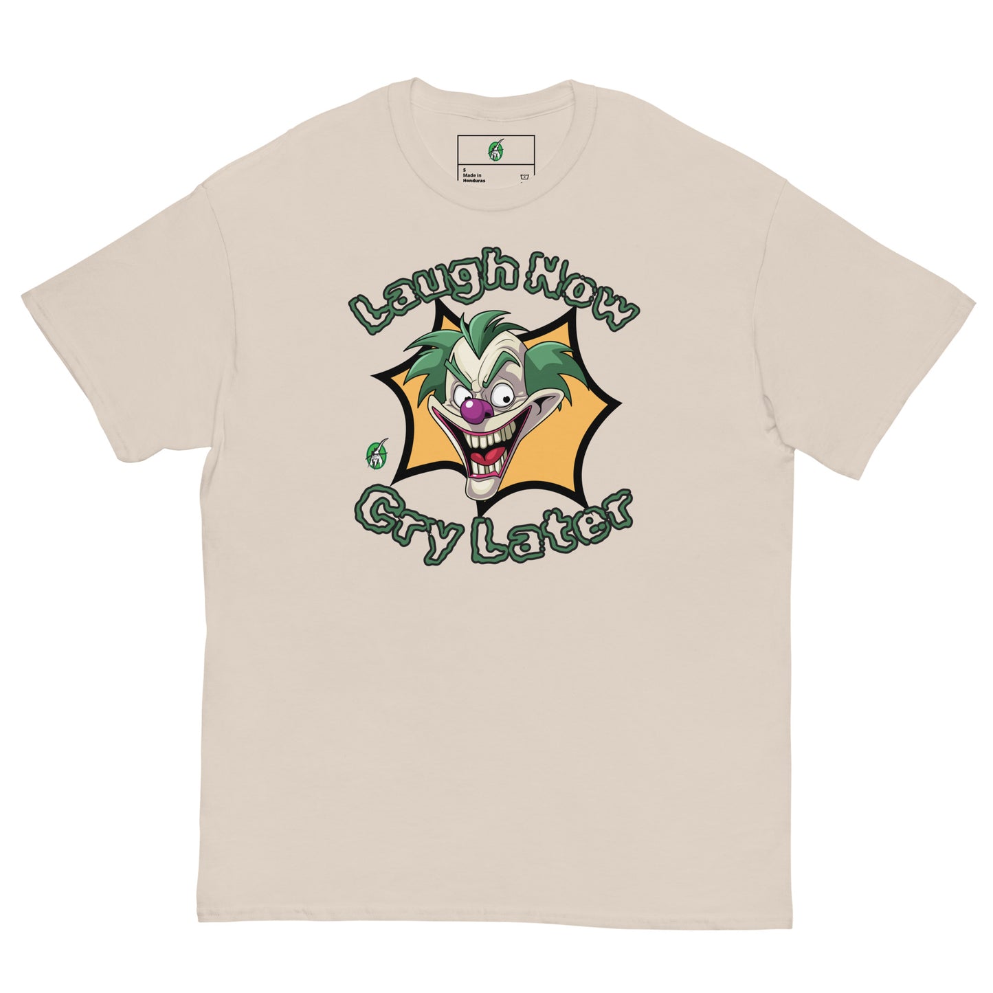 Men's beige t-shirt with a printed graphic of a clown with the words, 'Laugh Now Cry Later'. Designed by Wizard Prints.