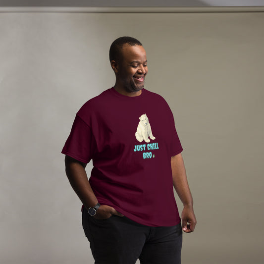 A man standing and wearing a maroon t-shirt with a printed graphic of a bear with the words, 'Just Chill Bro'. Designed by Wizard Prints.