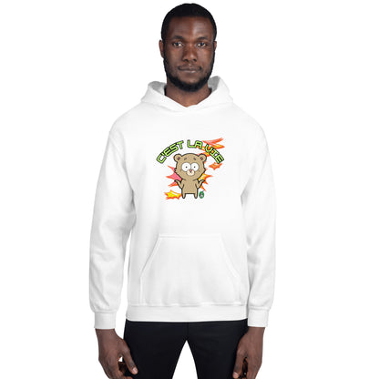 A man standing wearing a white hoodie by Wizard Prints featuring a printed graphic of a shrugging cartoon bear and the words, C'est La Vie.