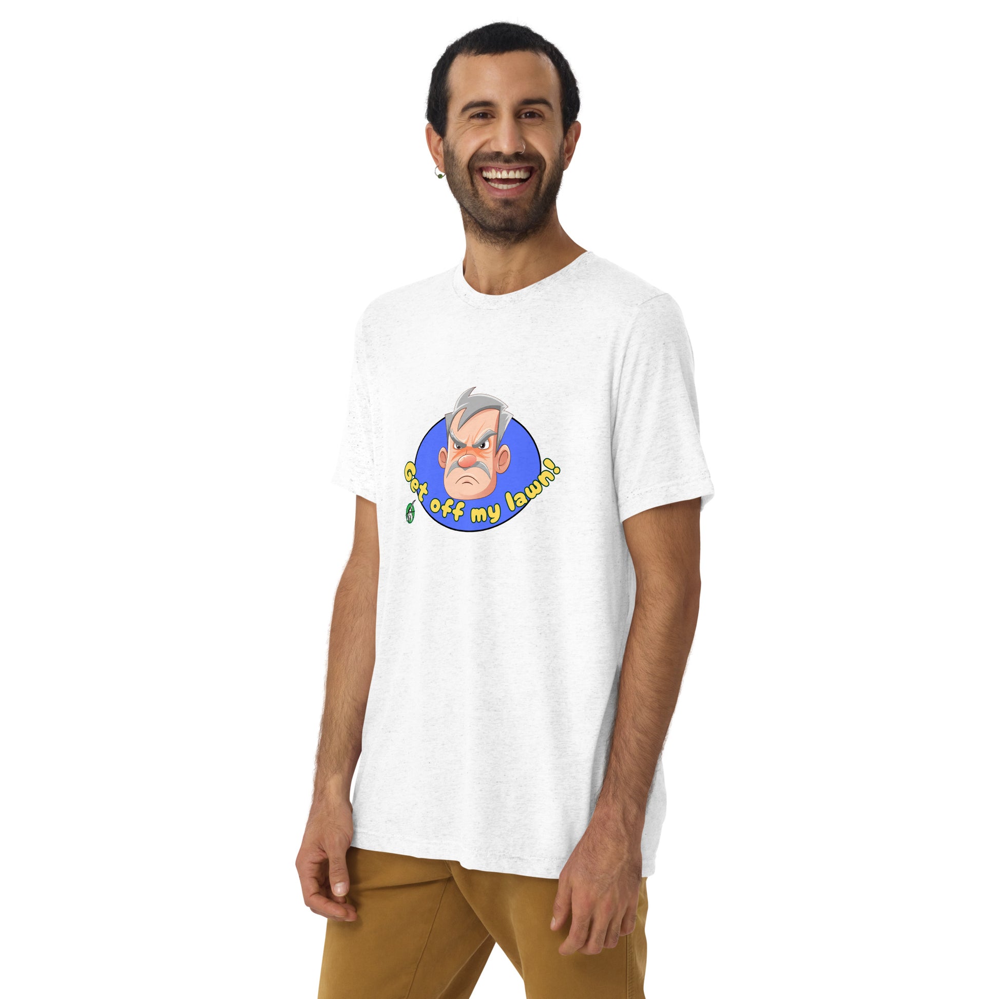 A man standing wearing a white tee shirt with a printed graphic of an old man's grumpy face with the words, Get Off My Lawn. Designed by Wizard Prints