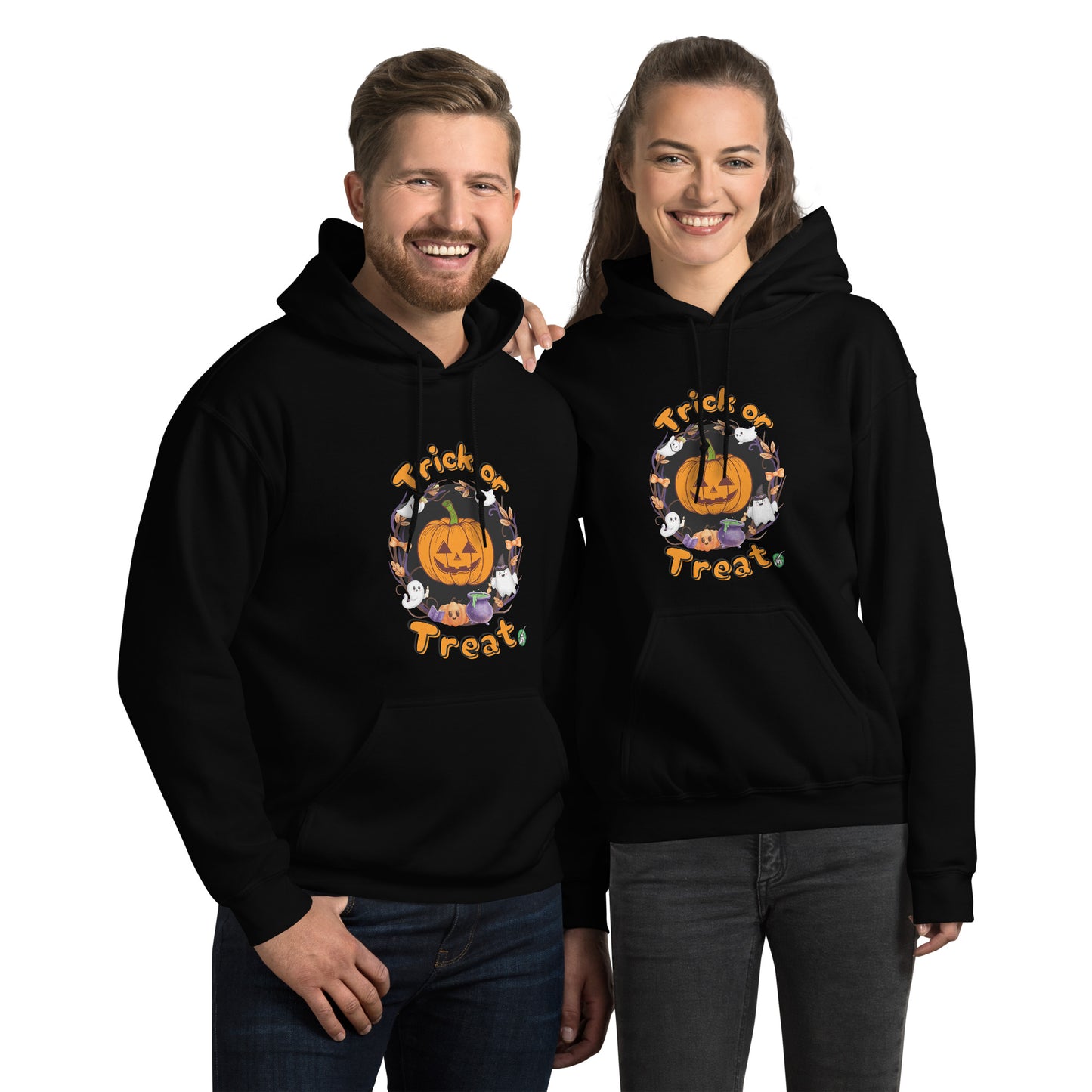A man and woman standing wearing a Wizard Prints Halloween hoodie in black with a printed graphic on the front of a pumpkin saying Trick or Treat!