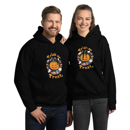 A man and woman standing wearing a Wizard Prints Halloween hoodie in black with a printed graphic on the front of a pumpkin saying Trick or Treat!