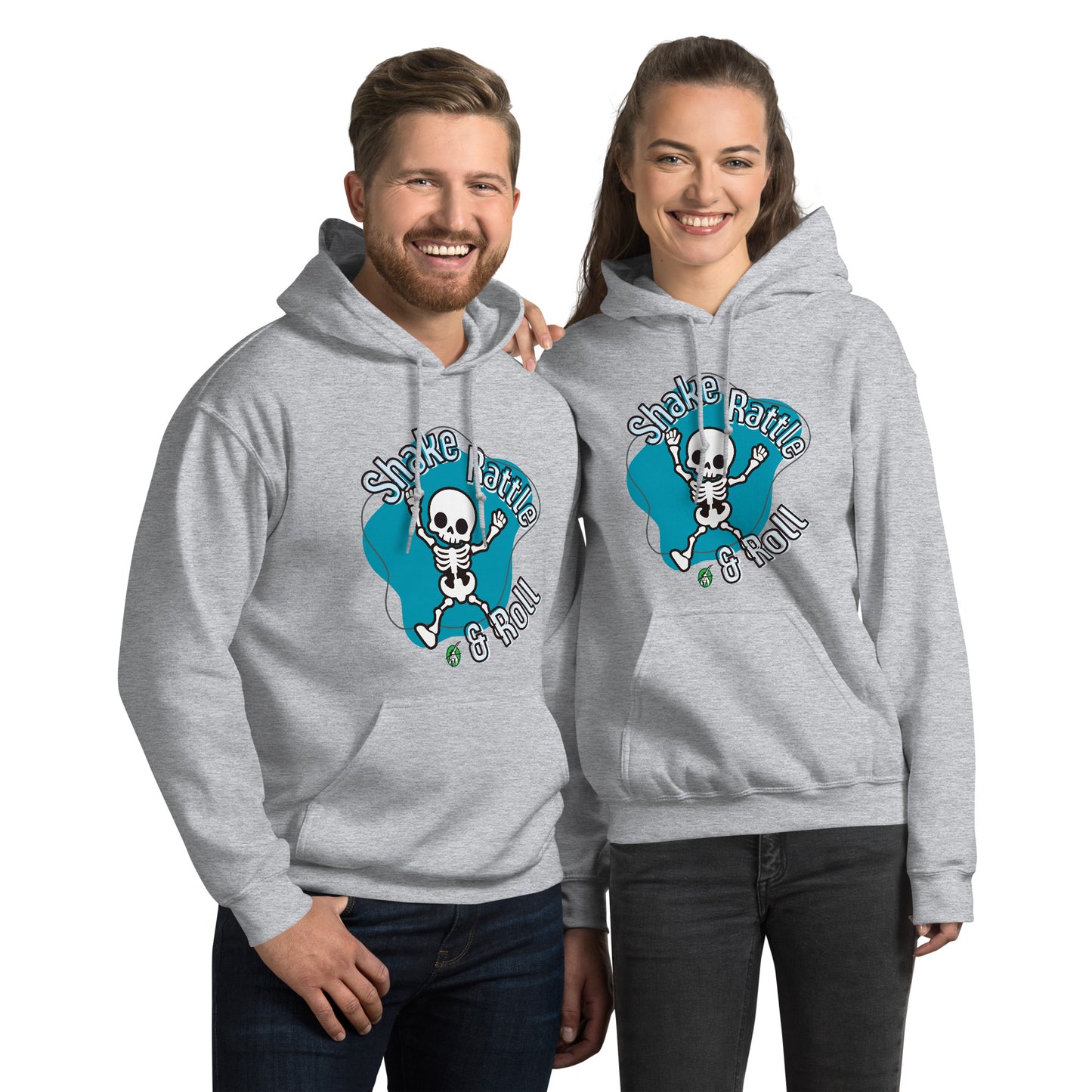 A man and woman standing wearing a Wizard Prints Halloween grey hoodie with a printed graphic on the front of a Skeleton dancing saying Shake Rattle and Roll!