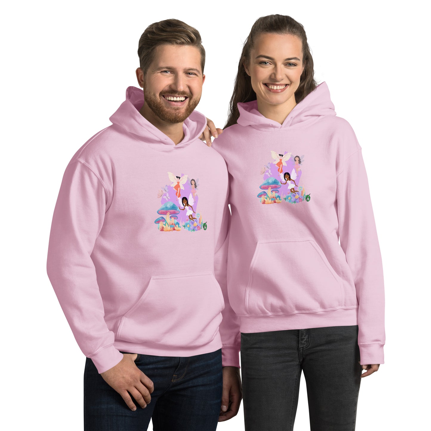 A man and a woman standing wearing a light pink hoodie featuring a graphic of fairies flying over mushrooms, designed by Wizard Prints.