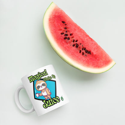 White Wizard Prints mug with a cartoon sloth design and 'Magical Wake up Juice' text next to a slice of watermelon on a light background