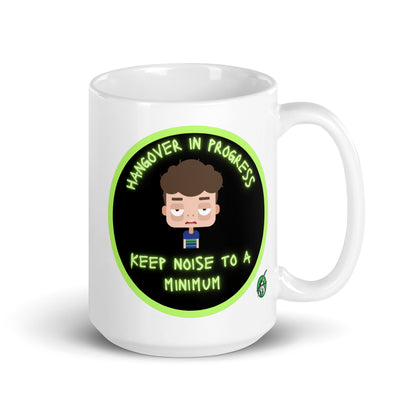 Wizard Prints white graphic mug with a sleepy cartoon character and 'Hangover in progress. Keep noise to a minimum' text on a white background.
