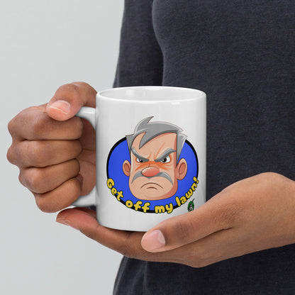 Person holding a white Wizard Prints grumpy old man mug with a cartoon old man graphic and 'Get off my lawn!' text.