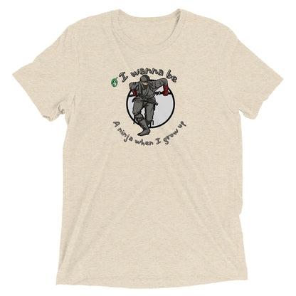 Women's beige t-shirt by Wizard Prints featuring a printed graphic of a ninja with the words, I wanna be a ninja when I grow up.