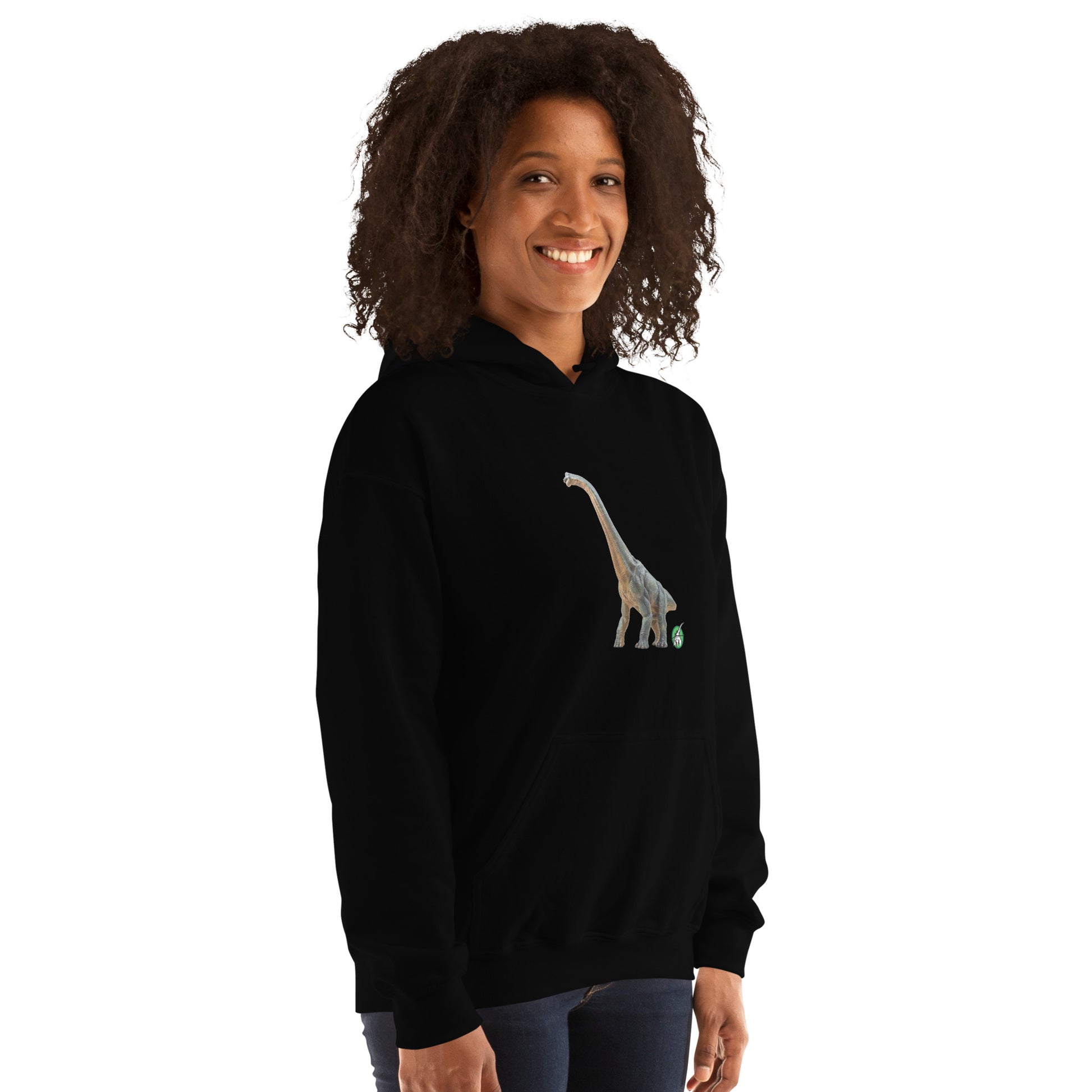 A woman standing wearing a black hoodie with a printed graphic of a life like dinosaur, designed by Wizard Prints