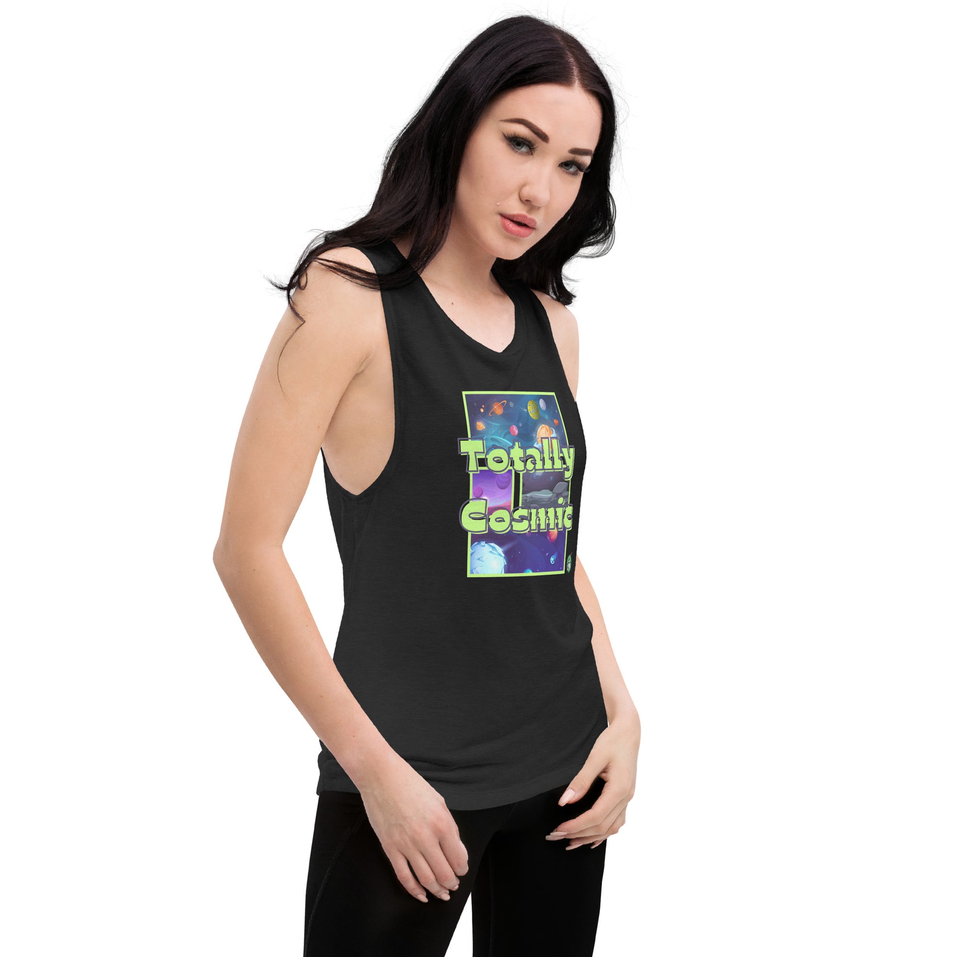 A woman standing wearing a black tank top by Wizard Prints with a printed graphic of colorful planets in the background with the words “Totally Cosmic” on top.