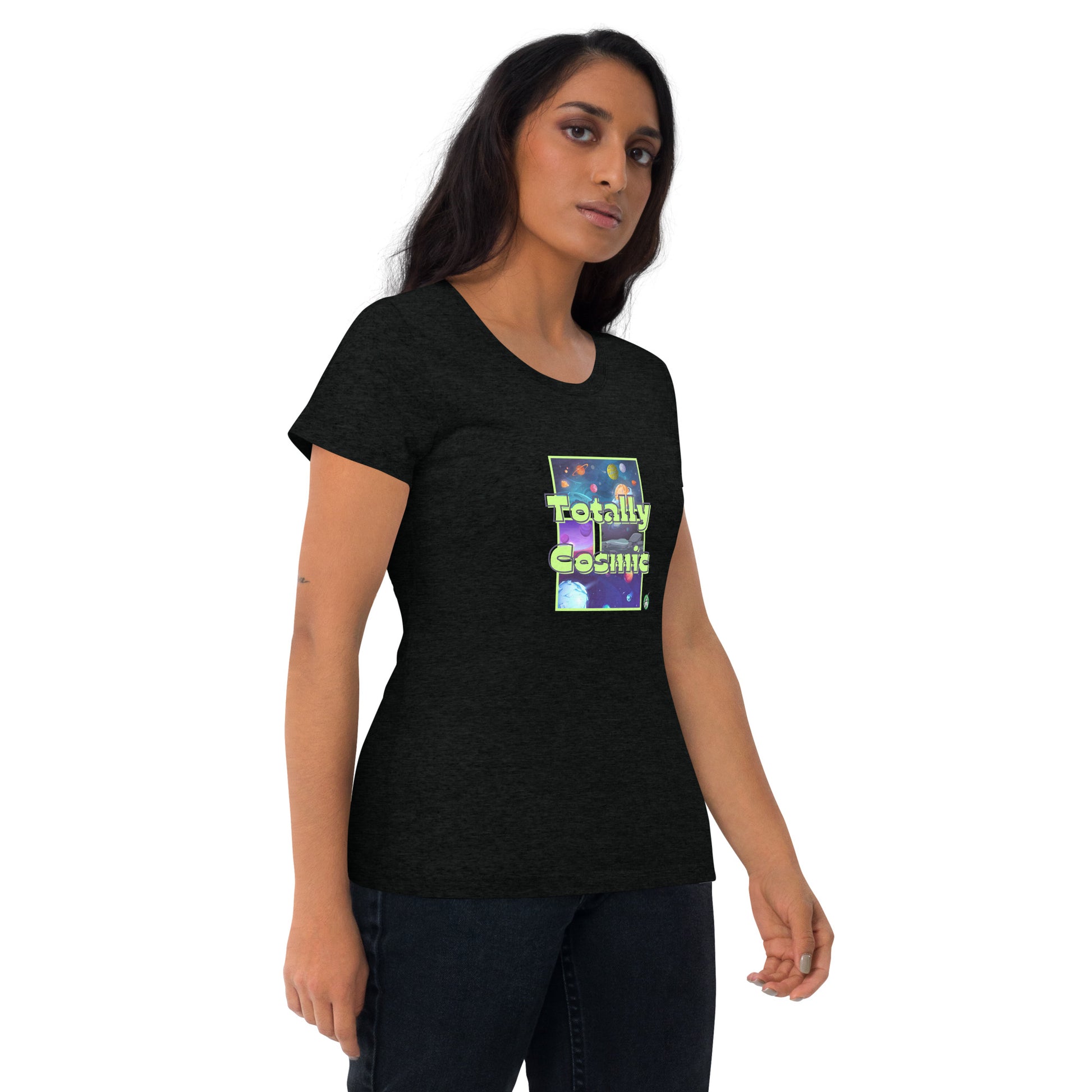 A woman standing wearing a black t-shirt by Wizard Prints featuring a printed graphic of colorful planets in the background with the words “Totally Cosmic” on top.
