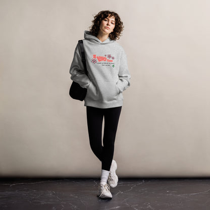 A woman standing wearing a grey hoodie by Wizard Prints featuring the bold text 'I Love You' and the plain text 'If people can hate for no reason, then I can love.'