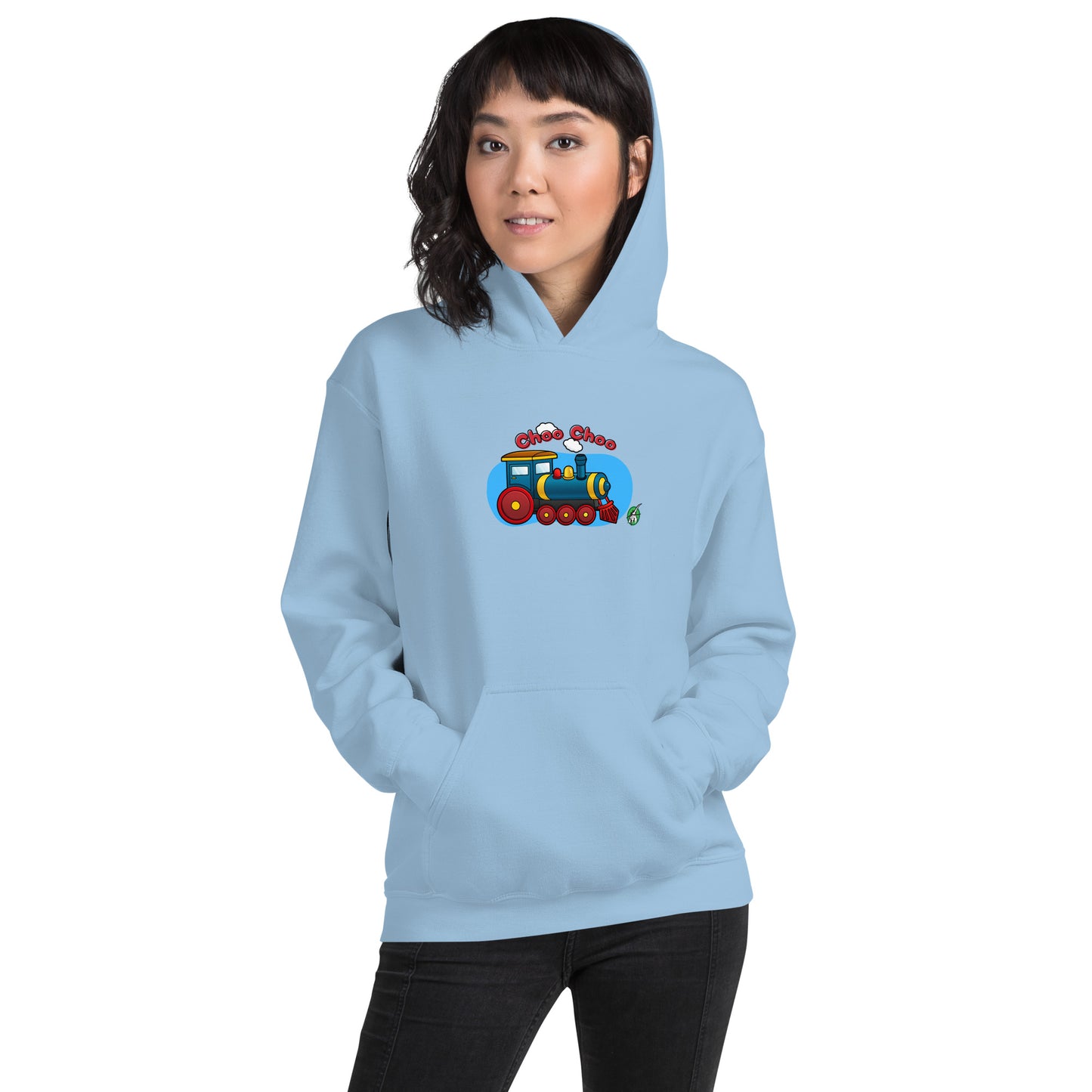 A woman standing wearing a light blue hoodie with a printed graphic of a cartoon train and the words 'Choo Choo'. Designed by Wizard Prints