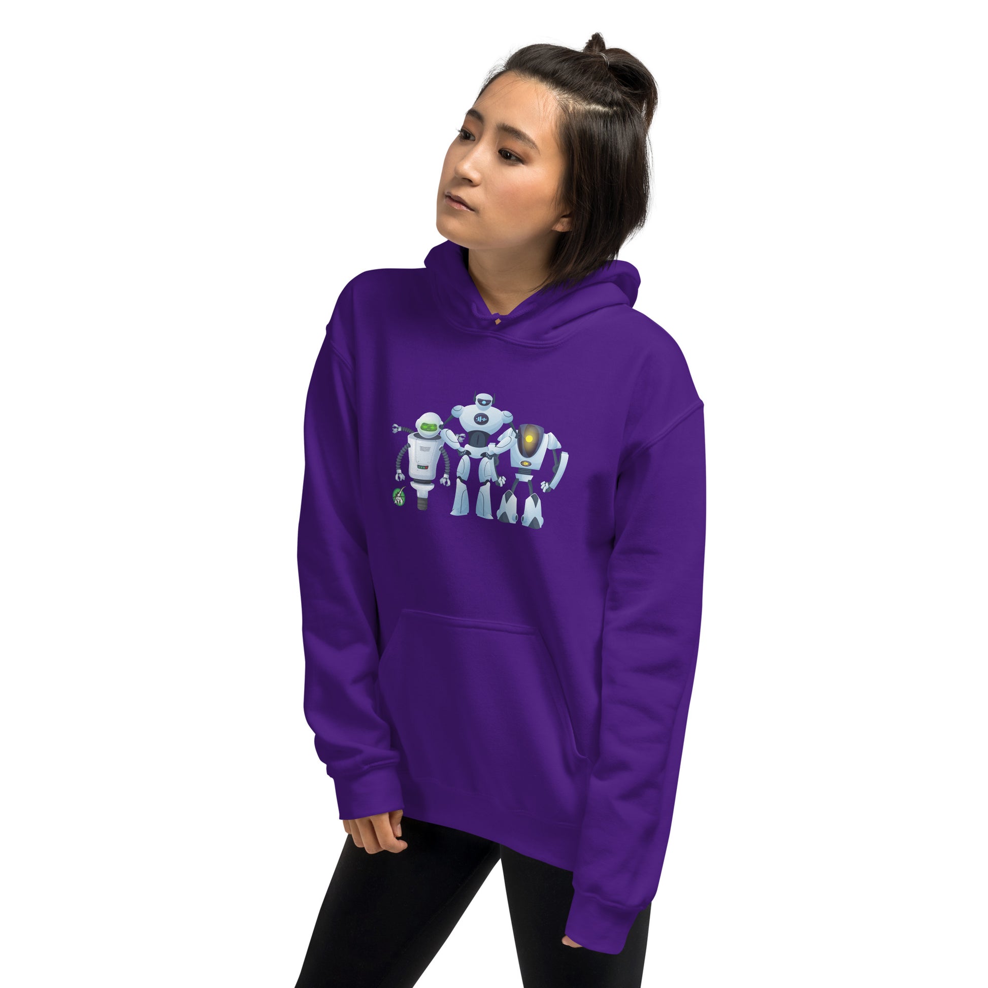 A woman standing wearing a purple hoodie with a printed graphic of three cartoon robots, designed by Wizard Prints