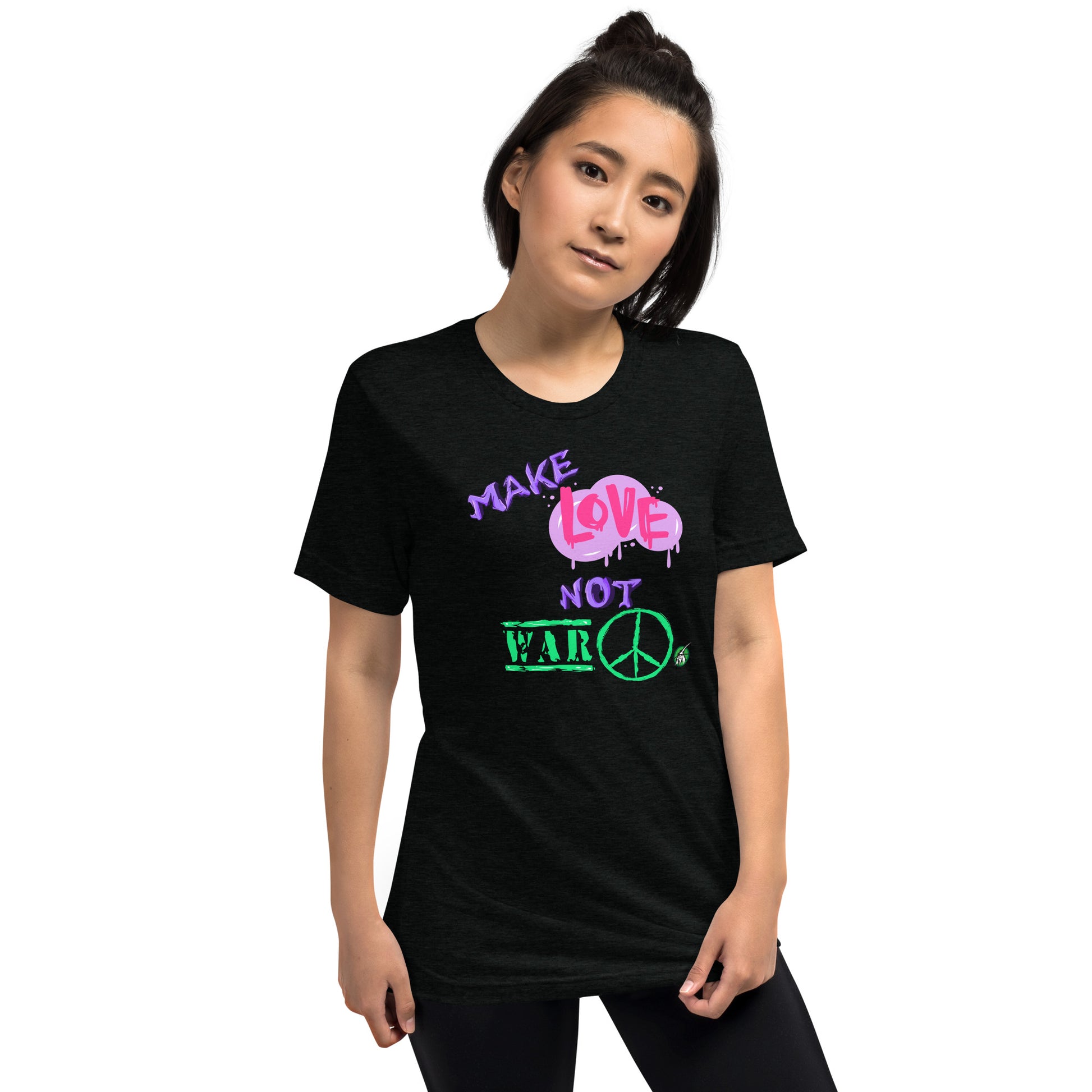 A Wizard Prints women's graphic rebel t-shirt in black with a printed graphic on the front of Make-Love-Not-War graphitti style 