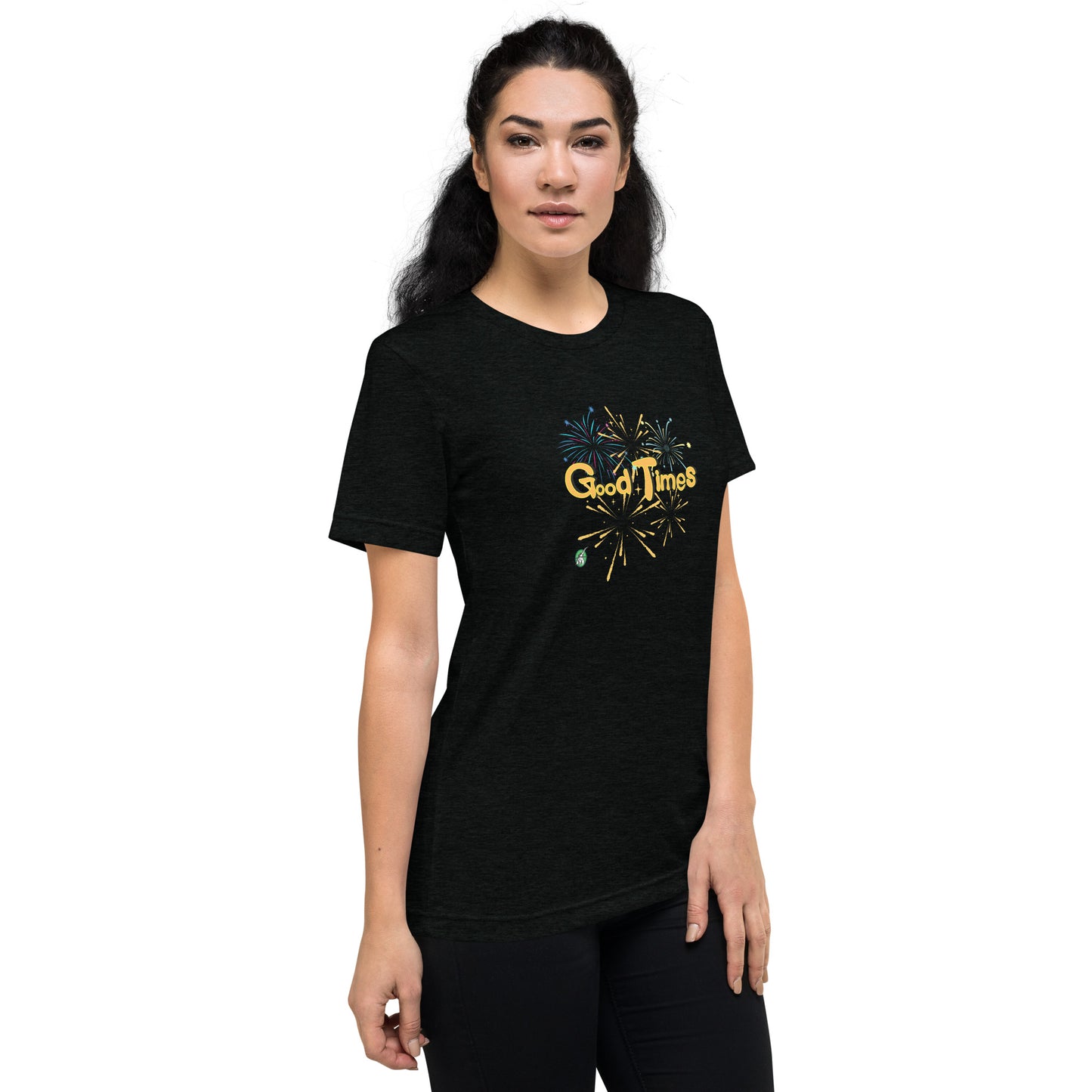 A woman standing wearing a black tee shirt with a printed graphic of fireworks with the words, Good Times. Designed by Wizard Prints