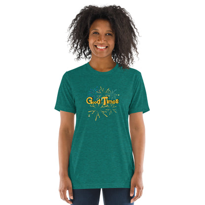 A woman standing wearing a blue green tee shirt with a printed graphic of fireworks with the words, Good Times. Designed by Wizard Prints