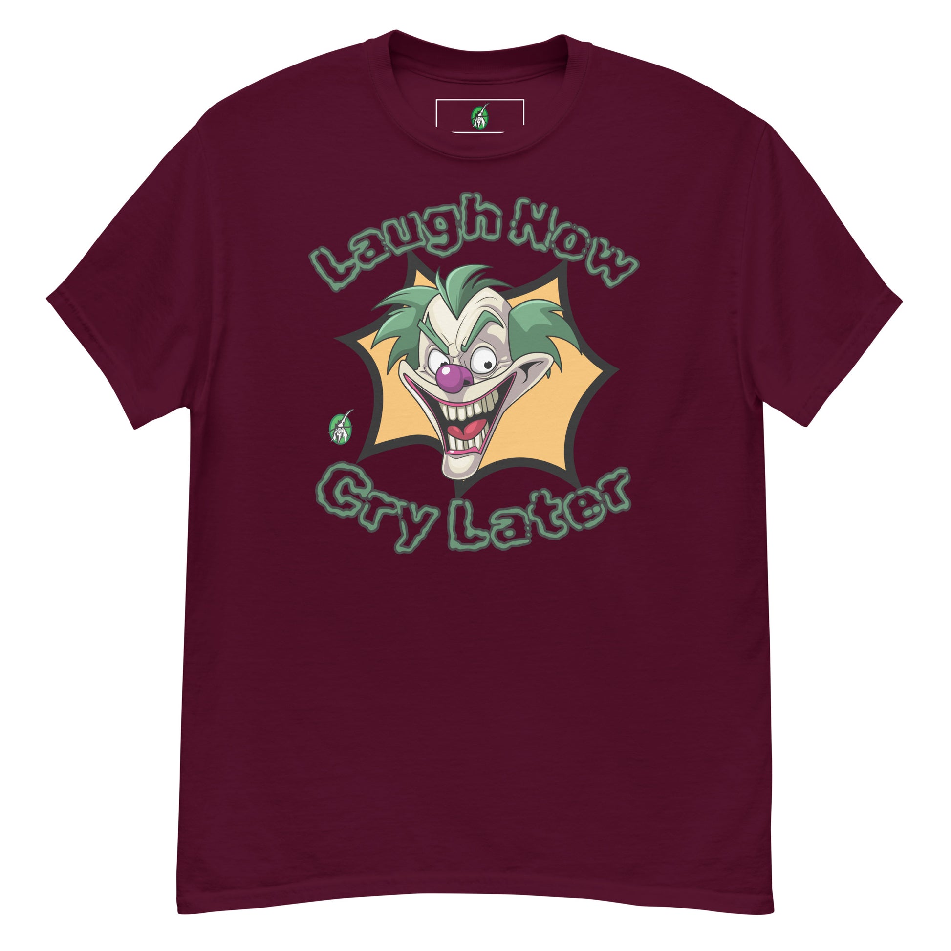 Women's maroon t-shirt with a printed graphic of a clown with the words, 'Laugh Now, Cry Later'. Designed by Wizard Prints.