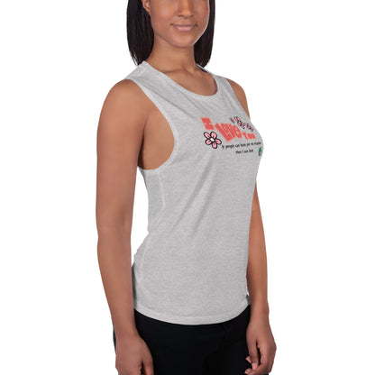 A woman standing wearing a grey tank top by Wizard Prints with a printed graphic of the bold text 'I Love You' and the plain text 'If people can hate for no reason, then I can love.'