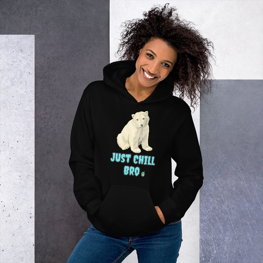 A woman standing wearing a black hoodie with a printed graphic of a bear with the words, 'Just Chill Bro'. Designed by Wizard Prints.
