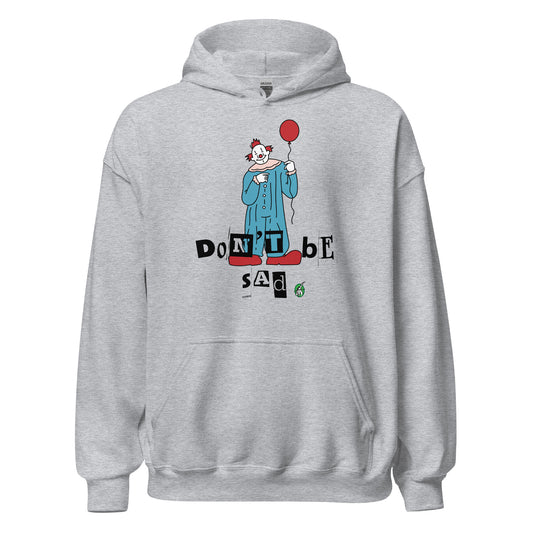 Women's grey hoodie with a printed graphic of a clown holding a balloon with the words, 'Don't Be Sad'. Designed by Wizard Prints.
