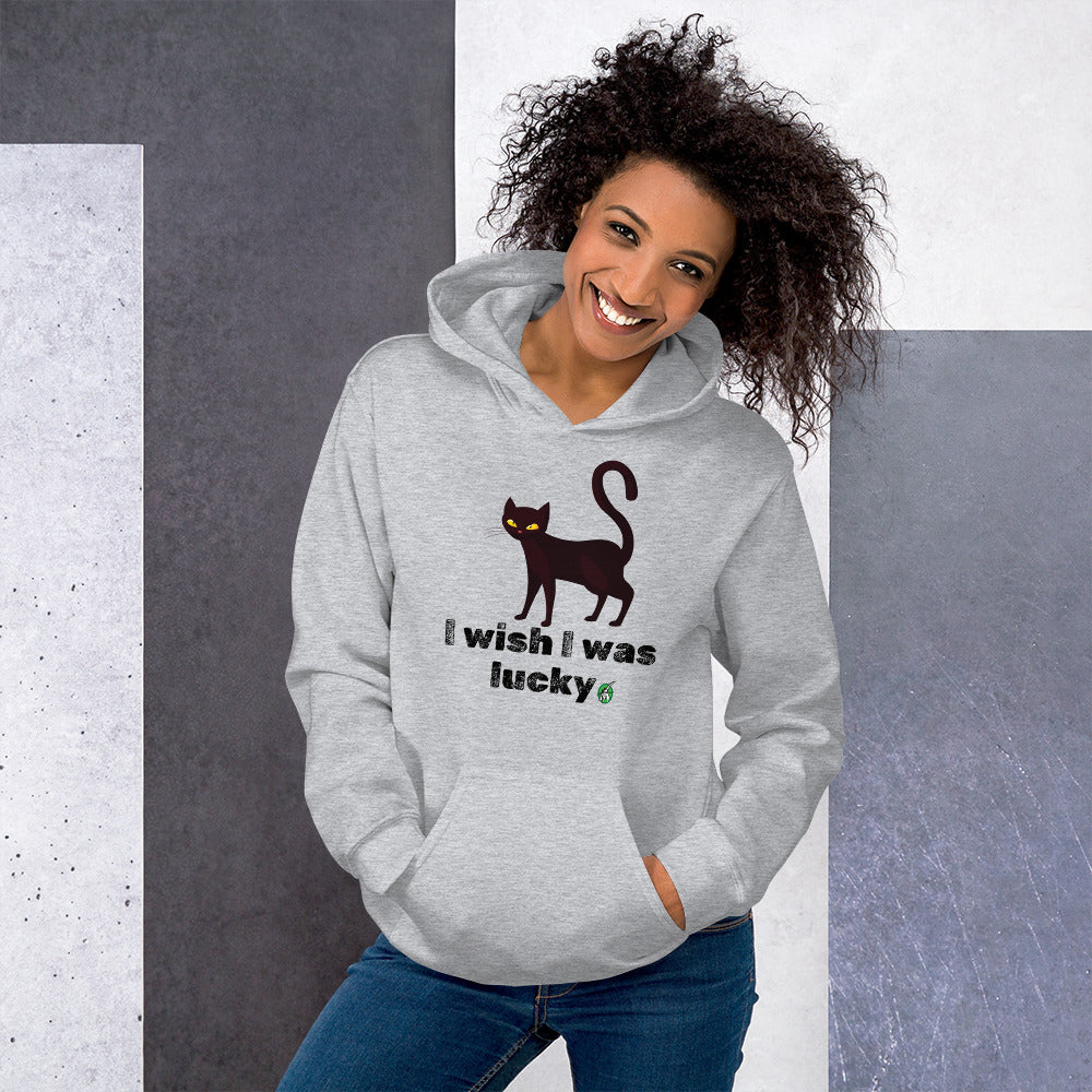 A woman standing and wearing a grey hoodie with a printed graphic of a cat with the words, 'I wish I was lucky'. Designed by Wizard Prints.