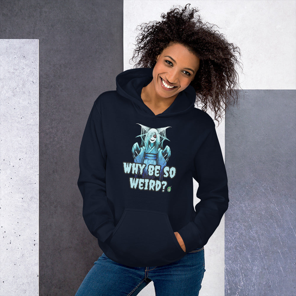 A woman standing and wearing a navy hoodie with a printed graphic of a blue ghost girl with the words, 'Why Be So Weird?'. Designed by Wizard Prints.