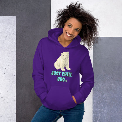 A woman standing wearing a purple hoodie with a printed graphic of a bear with the words, 'Just Chill Bro'. Designed by Wizard Prints.