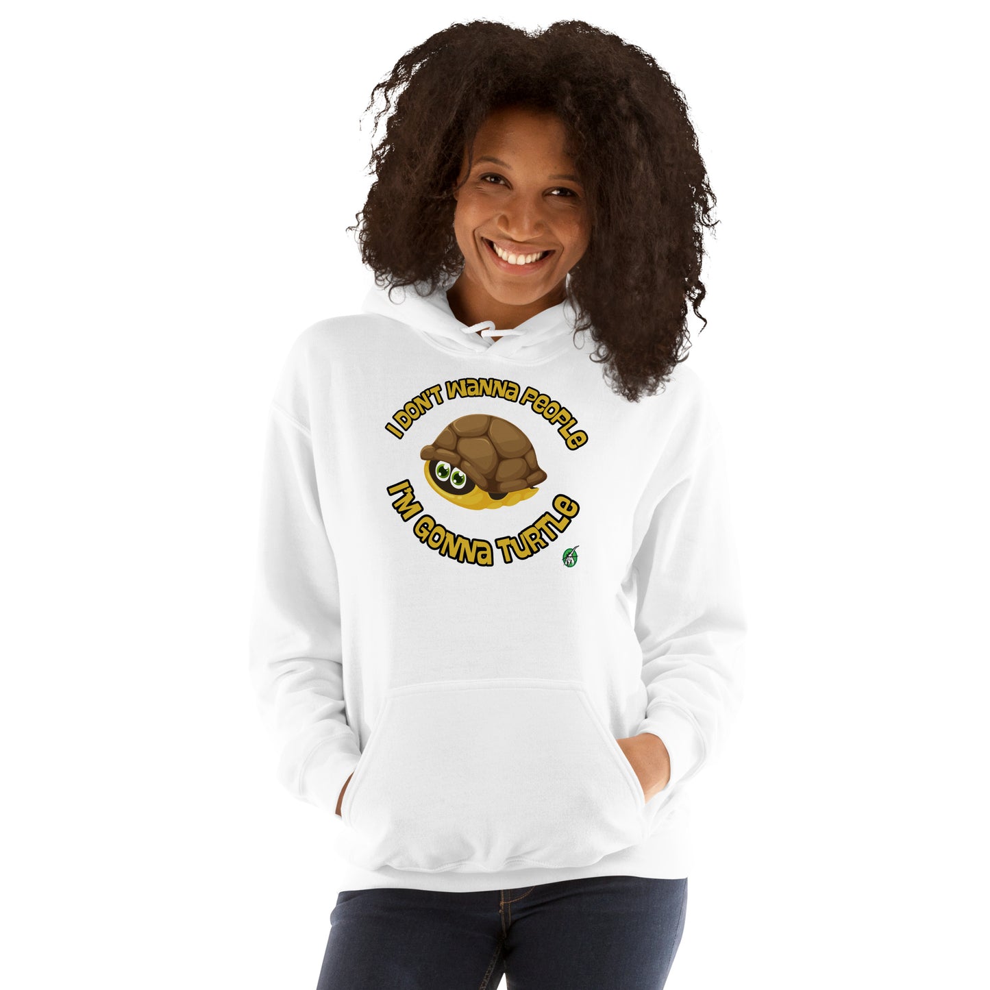 A woman standing wearing a white hoodie with a printed graphic of a turtle with the words, 'I Don't Wanna People, I'm Gonna Turtle'. Designed by Wizard Prints.