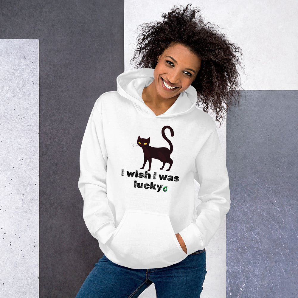 A woman standing and wearing a white hoodie with a printed graphic of a cat with the words, 'I wish I was lucky'. Designed by Wizard Prints.