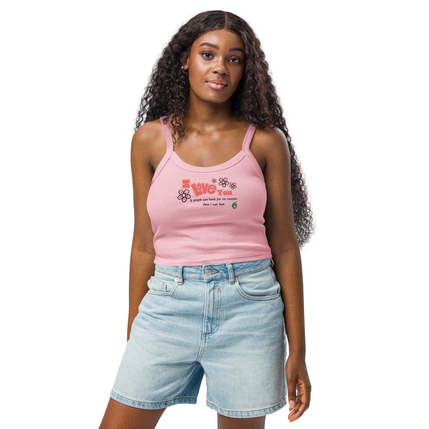 A woman standing wearing a pink tank top by Wizard Prints with the bold text 'I Love You' and the plain text 'If people can hate for no reason, then I can love.'