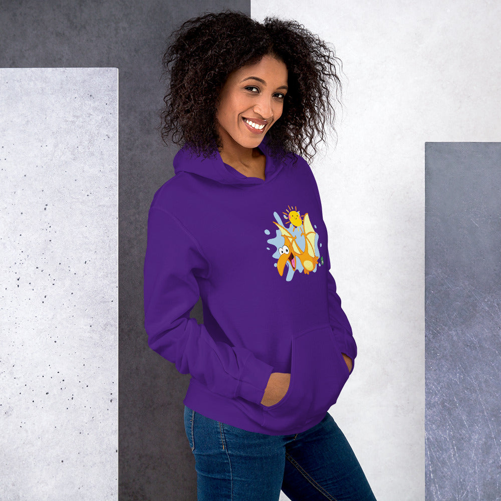 A woman standing wearing a purple hoodie with a printed graphic of a smiling cartoon dinosaur and the sun. Designed by Wizard Prints.