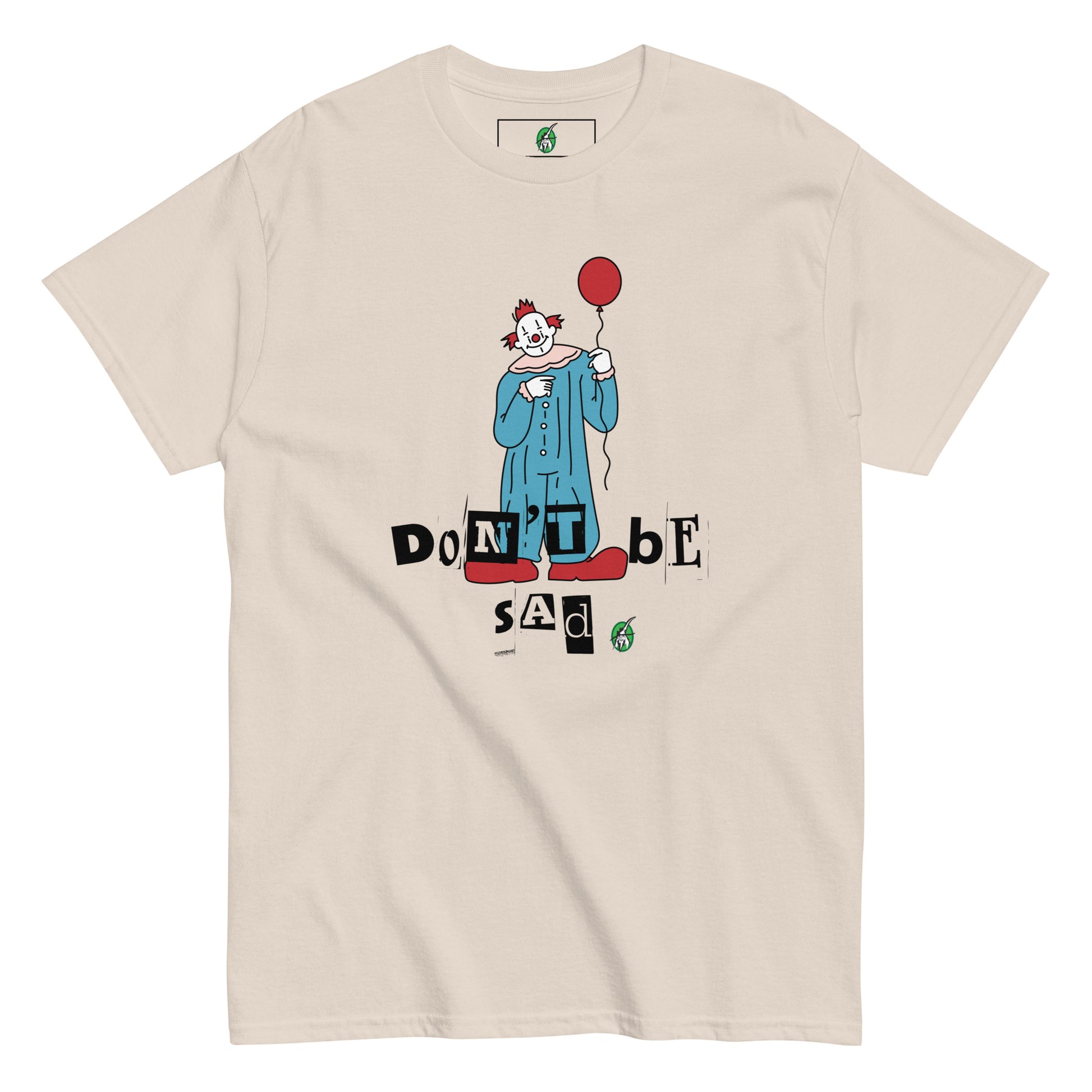 Women's beige T-Shirt with a printed graphic of a clown holding a balloon with the words, "Don't be sad". Designed by Wizard Prints.