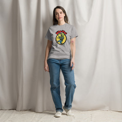 A woman standing and wearing a light grey t-shirt with a printed graphic of a zombie with the words, Bite Me'. Designed by Wizard Prints.