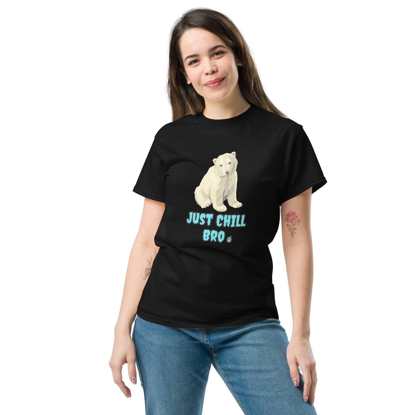 A woman standing and wearing a black t-shirt with a printed graphic of a bear with the words, 'Just Chill Bro'. Designed by Wizard Prints.