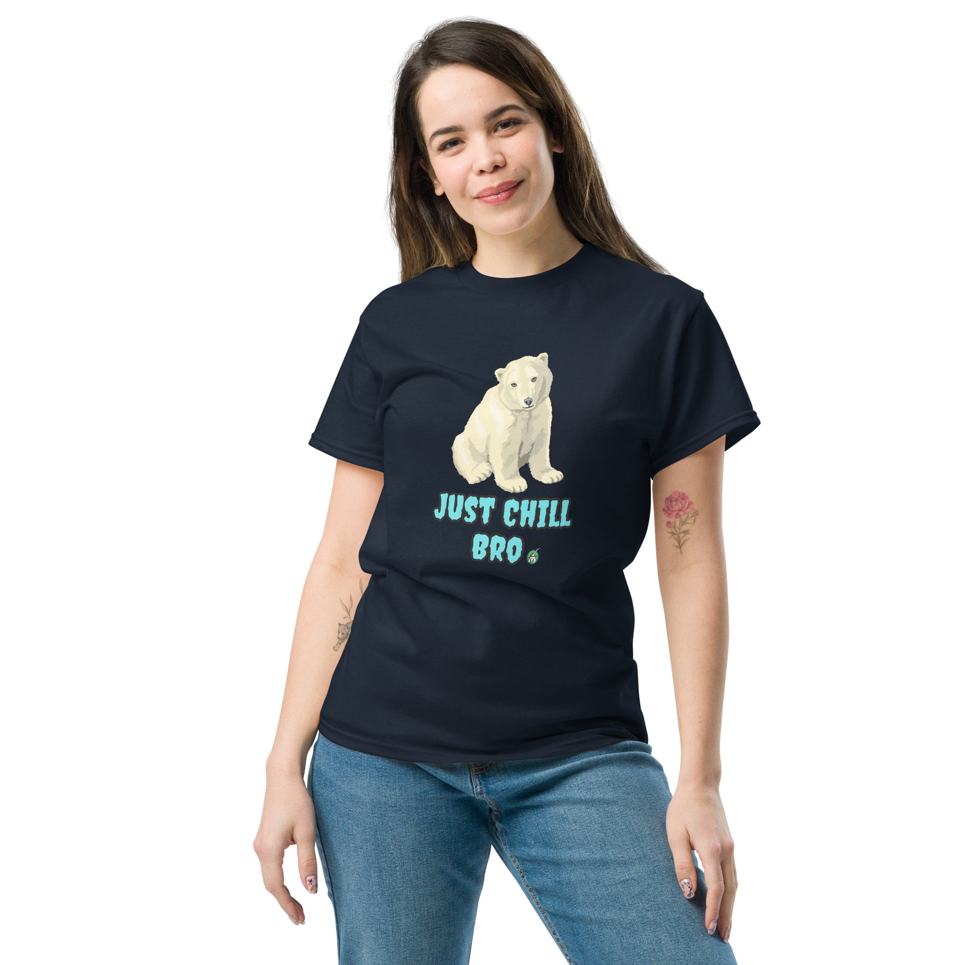 A woman standing and wearing a navy t-shirt with a printed graphic of a bear with the words, 'Just Chill Bro'. Designed by Wizard Prints.