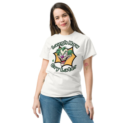 A woman standing wearing a white t-shirt with a printed graphic of a clown with the words, 'Laugh Now, Cry Later'. Designed by Wizard Prints.