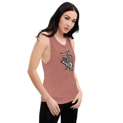 A woman standing wearing a mauve tank top by Wizard Prints with a printed graphic of a werewolf with the words, Bad Hair Day.