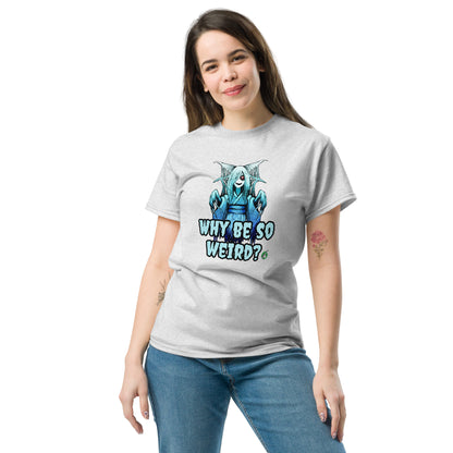 A woman standing and wearing a grey t-shirt with a printed graphic of a blue ghost girl with the words, 'Why Be So Weird?'. Designed by Wizard Prints.
