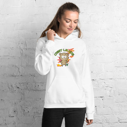 A woman standing wearing a white hoodie by Wizard Prints featuring a printed graphic of a shrugging cartoon bear and the words, C'est La Vie.